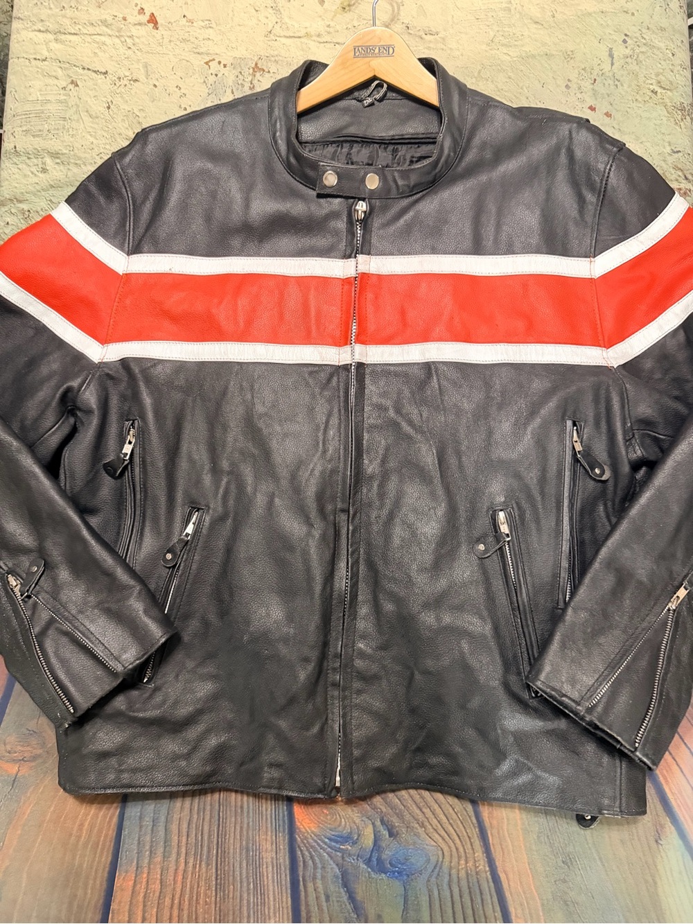 WildWear Black Leather Motorcycle Jacket with Orange and White Chest Stripes